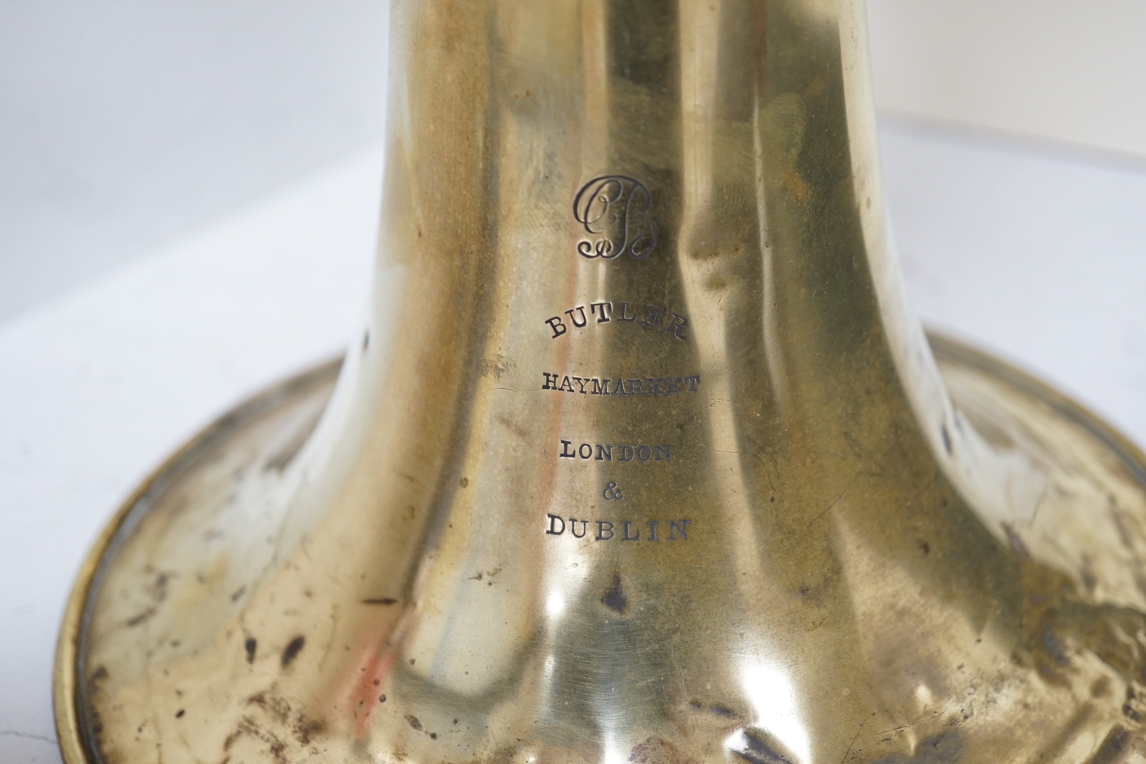 A brass euphonium by Butler, Haymarket, London and Dublin, 57cms long